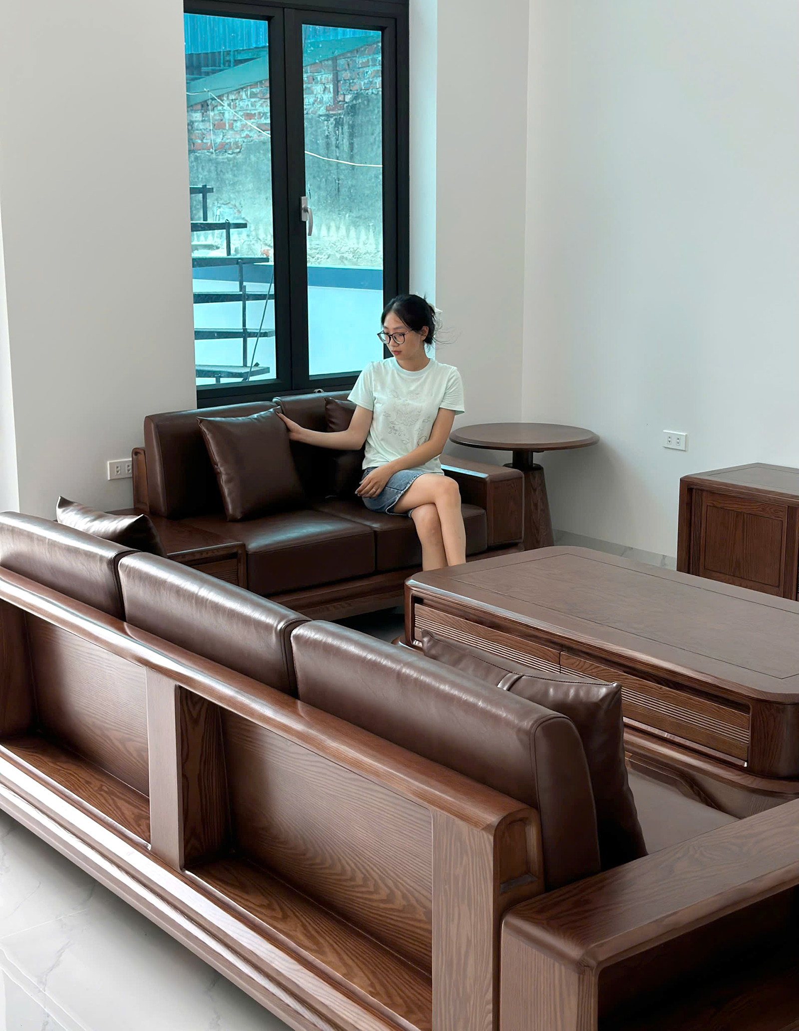 sofa bộ phòng khách gỗ tần bì bọc da